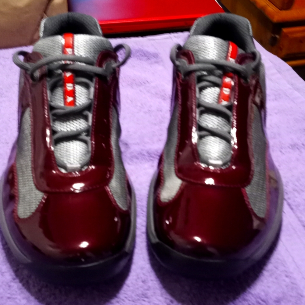 Men's size 12 Prada 100% real and been worn in home about 4 times brand new cond